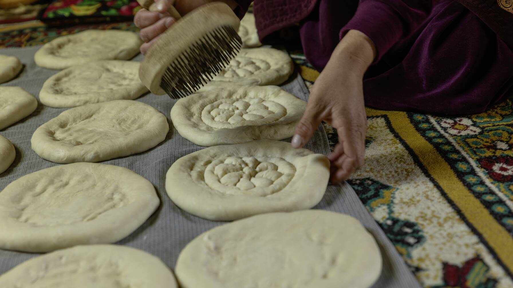 Along with potatoes, bread is one of the most important foods of the rural population in Tajikistan. Shokirjon's daughter-in-law bakes fresh bread twice a week.
