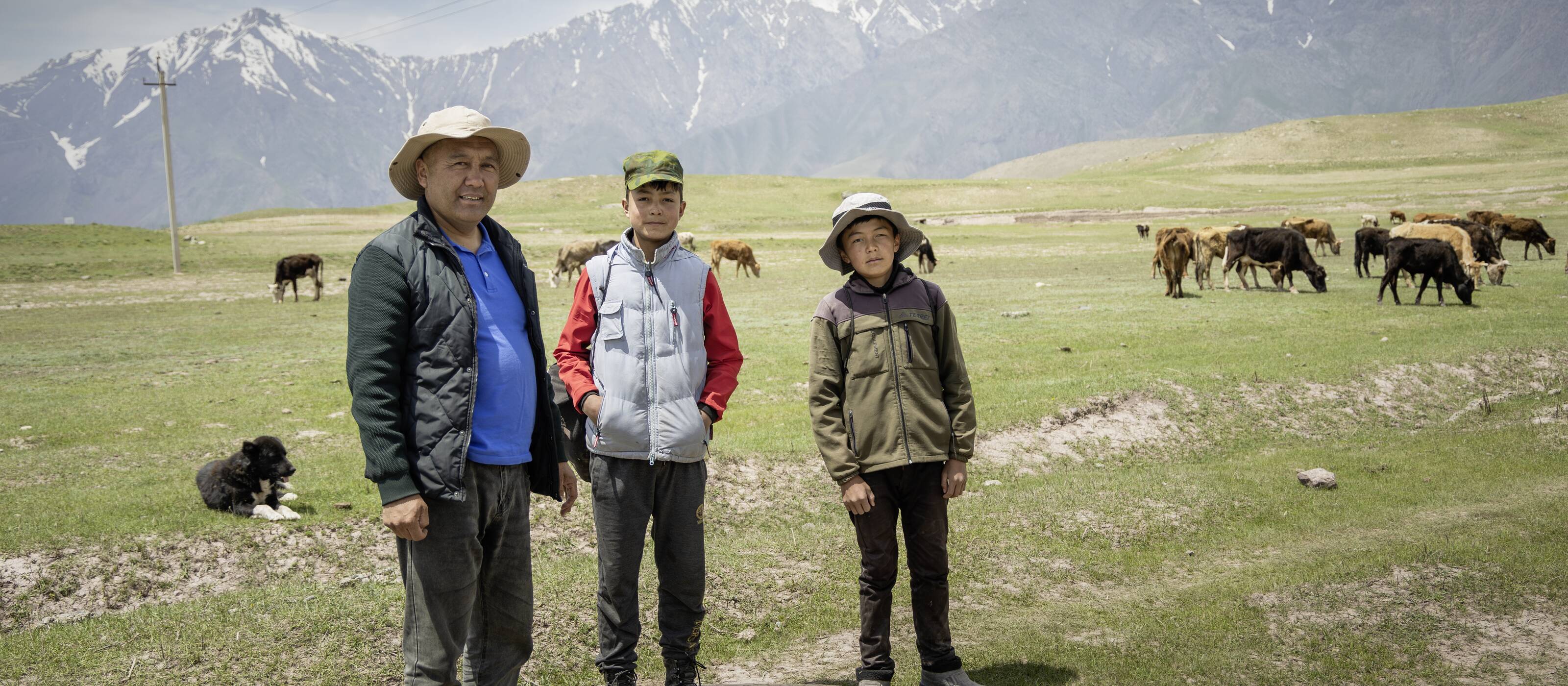 A Taiik farmer with his two sons, living in the Rasth valley